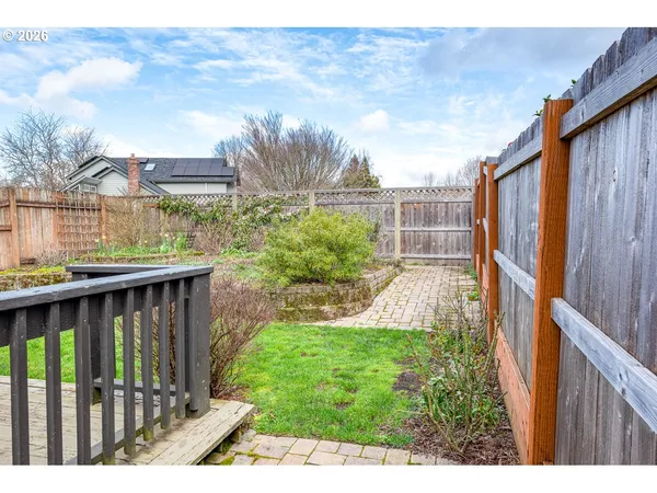 a house view with a garden space