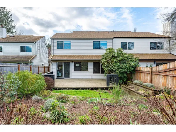 a house with trees in front of it
