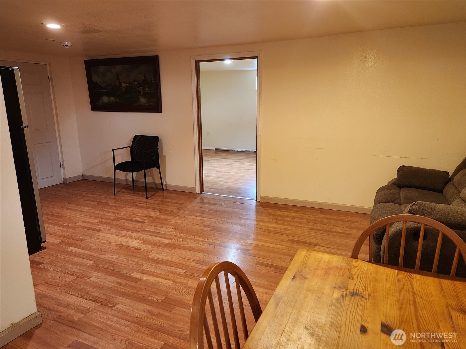 616 South 63rd Street Tacoma, WA 98408 - Photo 11 of 19 a view of furniture and floor to ceiling window