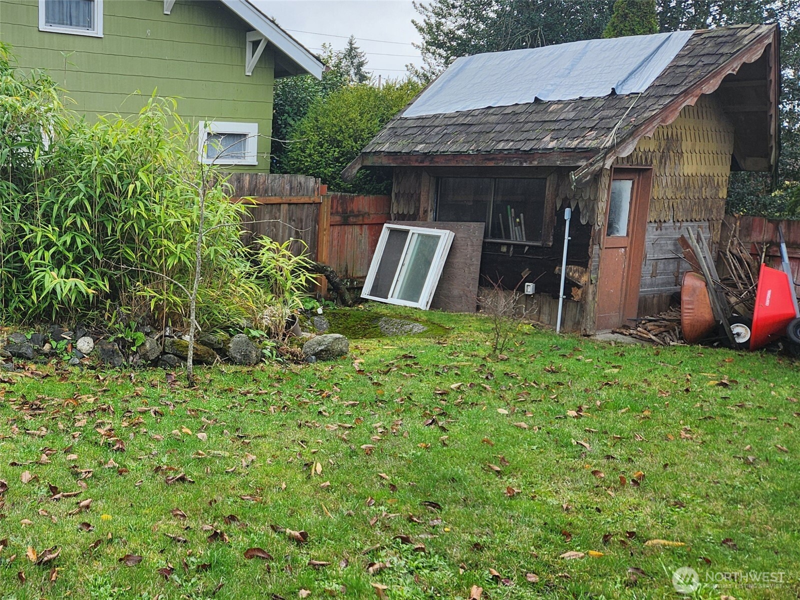 616 South 63rd Street Tacoma, WA 98408 - Photo 18 of 19 a view of a house with backyard and porch