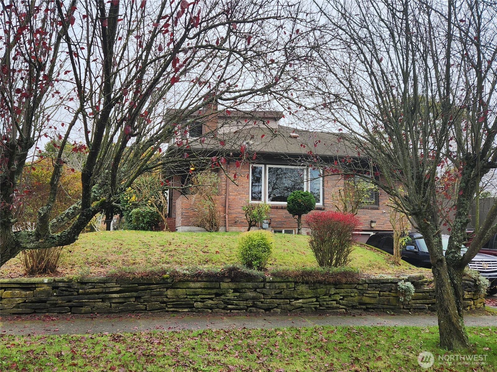 616 South 63rd Street Tacoma, WA 98408 - Photo 2 of 19 a front view of a house with a yard
