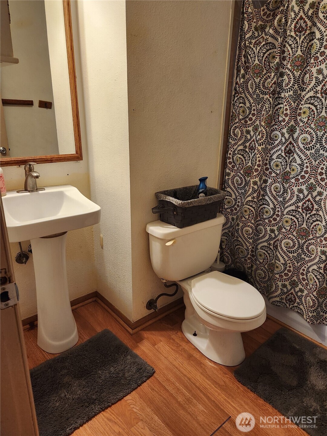 616 South 63rd Street Tacoma, WA 98408 - Photo 8 of 19 a bathroom with a toilet and a sink