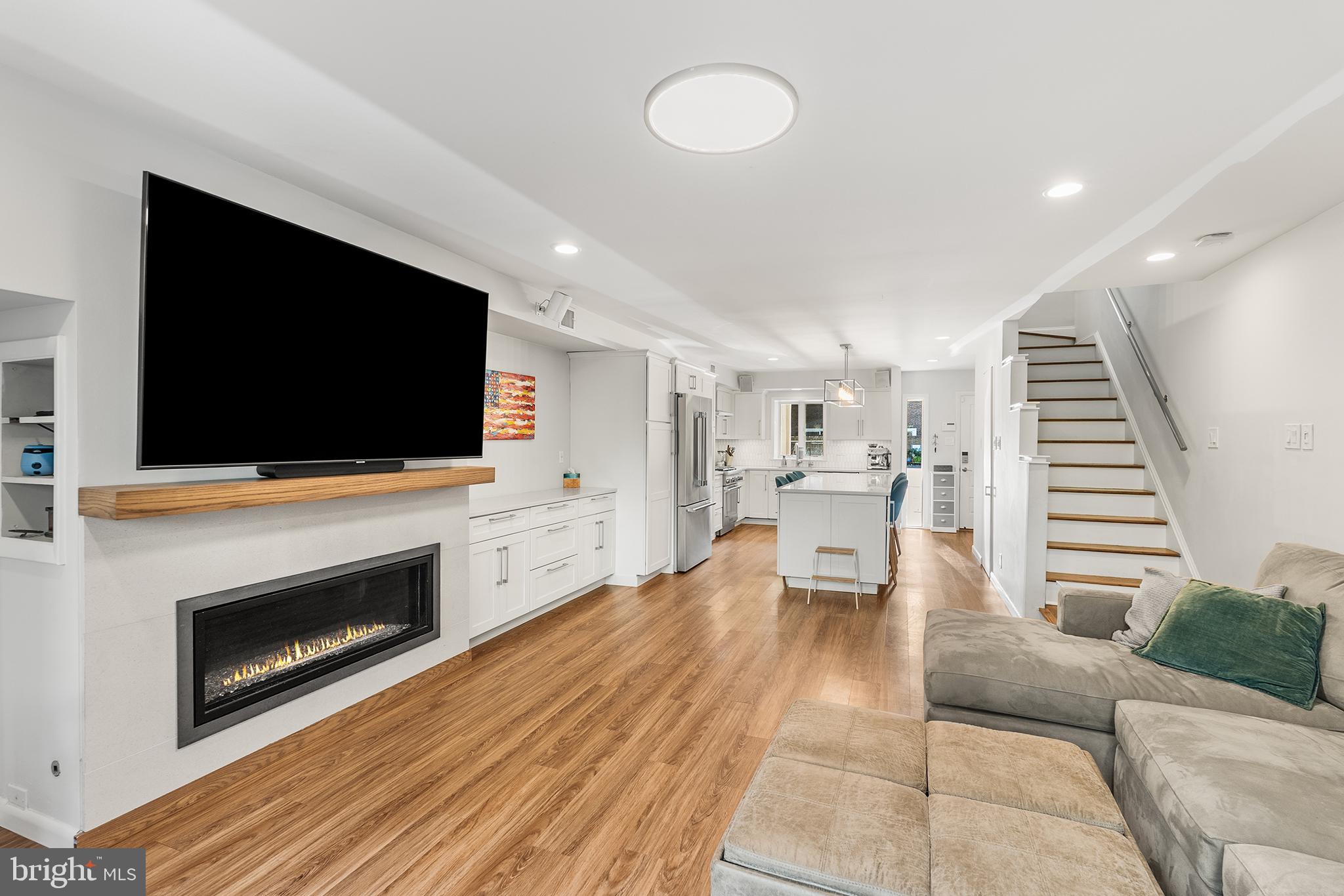 631 Addison Street Philadelphia, PA 19147 - Photo 6 of 25 Gas fireplace with glass accents