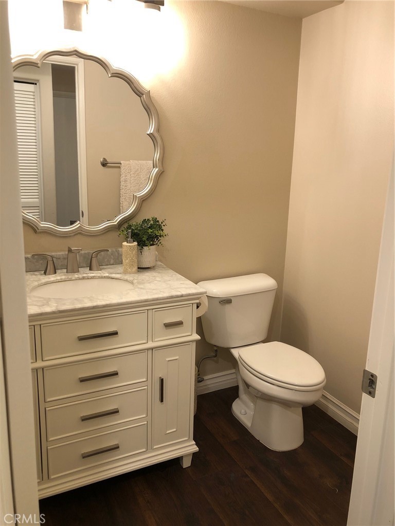 25530 Hemingway Avenue Stevenson Ranch, CA 91381 - Photo 14 of 29 a bathroom with a sink toilet and mirror