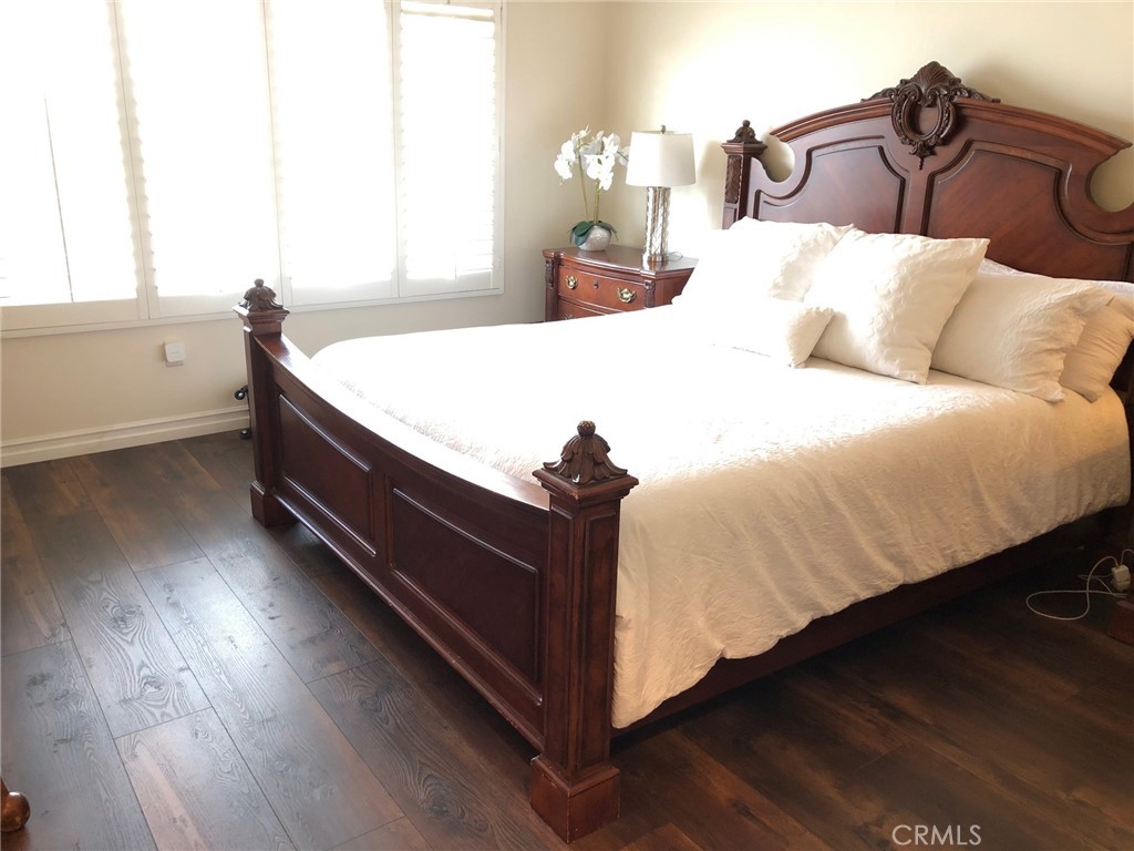 25530 Hemingway Avenue Stevenson Ranch, CA 91381 - Photo 19 of 29 a bed sitting in a bedroom next to a window