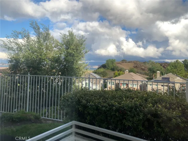 a view of a city from a balcony