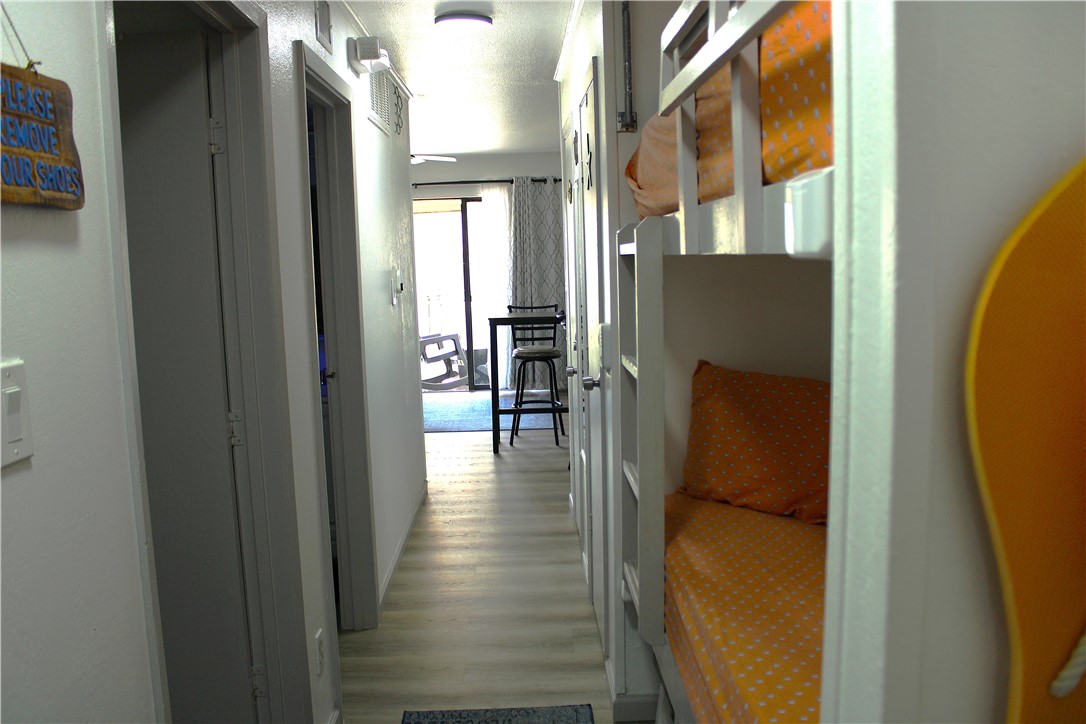 3938 Surfside Boulevard, Unit 3129 Corpus Christi, TX 78402 - Photo 2 of 39 a view of a living room with windows