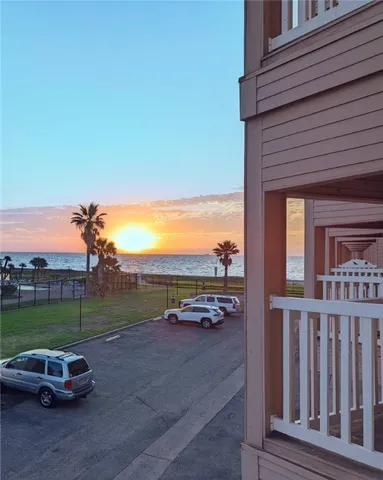 a view of a lake from a balcony