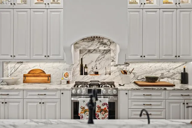 a view of a kitchen with appliances