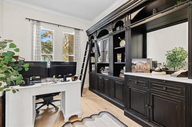 a dining room with furniture window wooden floor