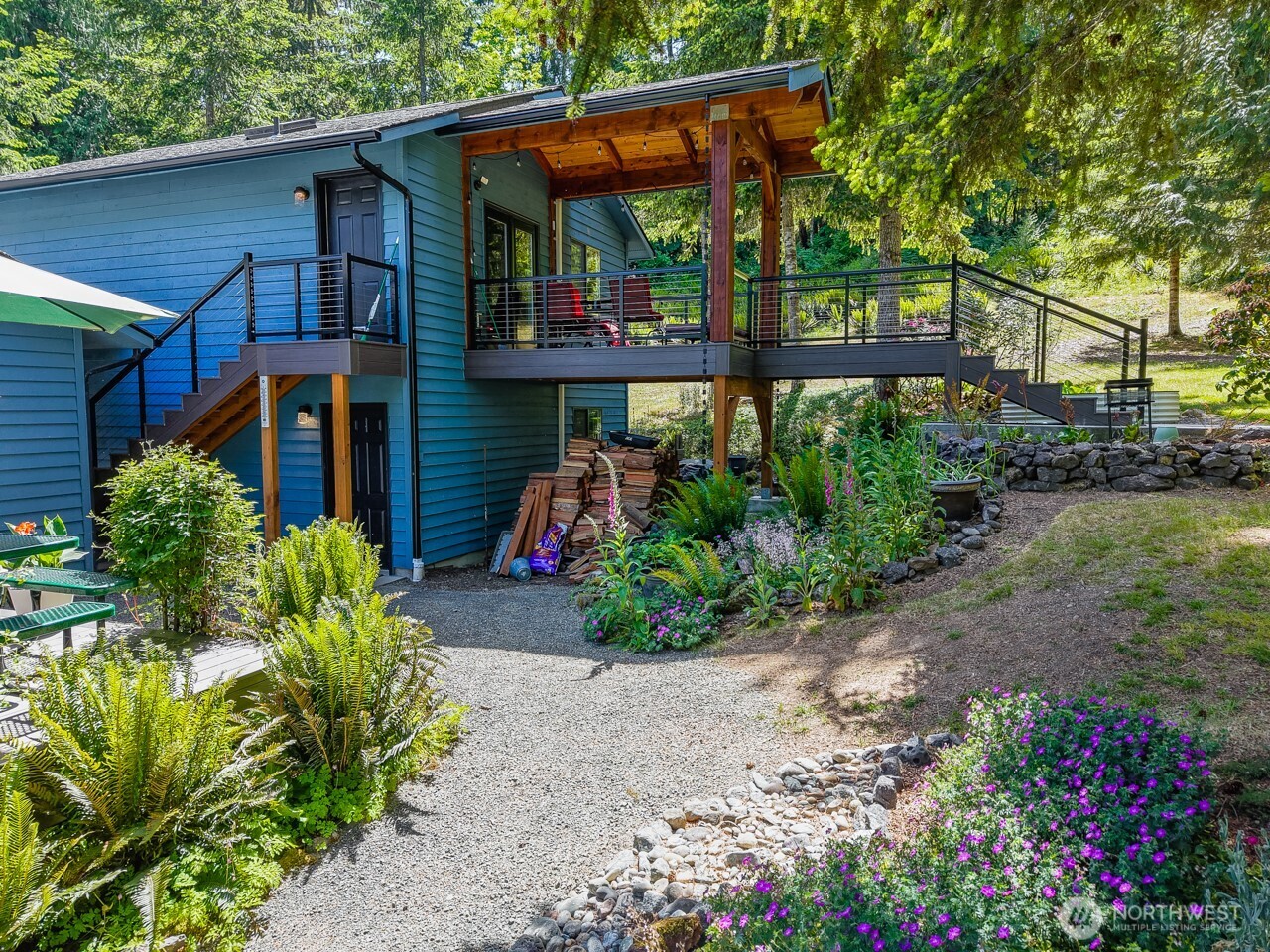492 Walkabout Way Port Angeles, WA 98363 - Photo 6 of 40 a front view of a house with garden