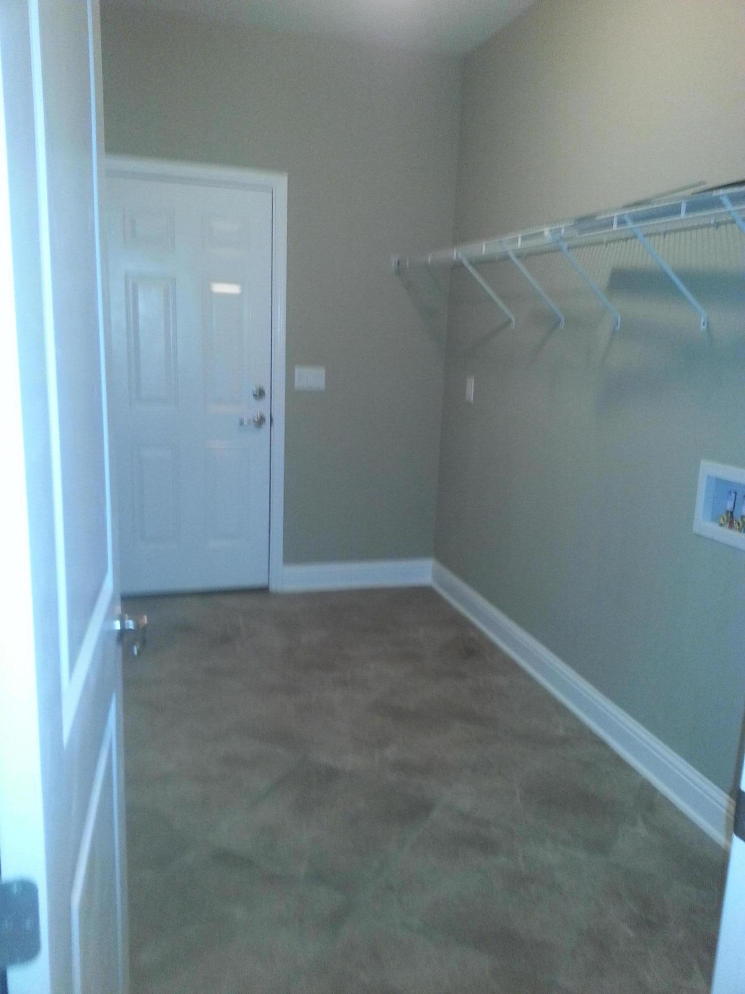 2442 Cove Road Navarre, FL 32566 - Photo 22 of 23 an empty room with an empty space