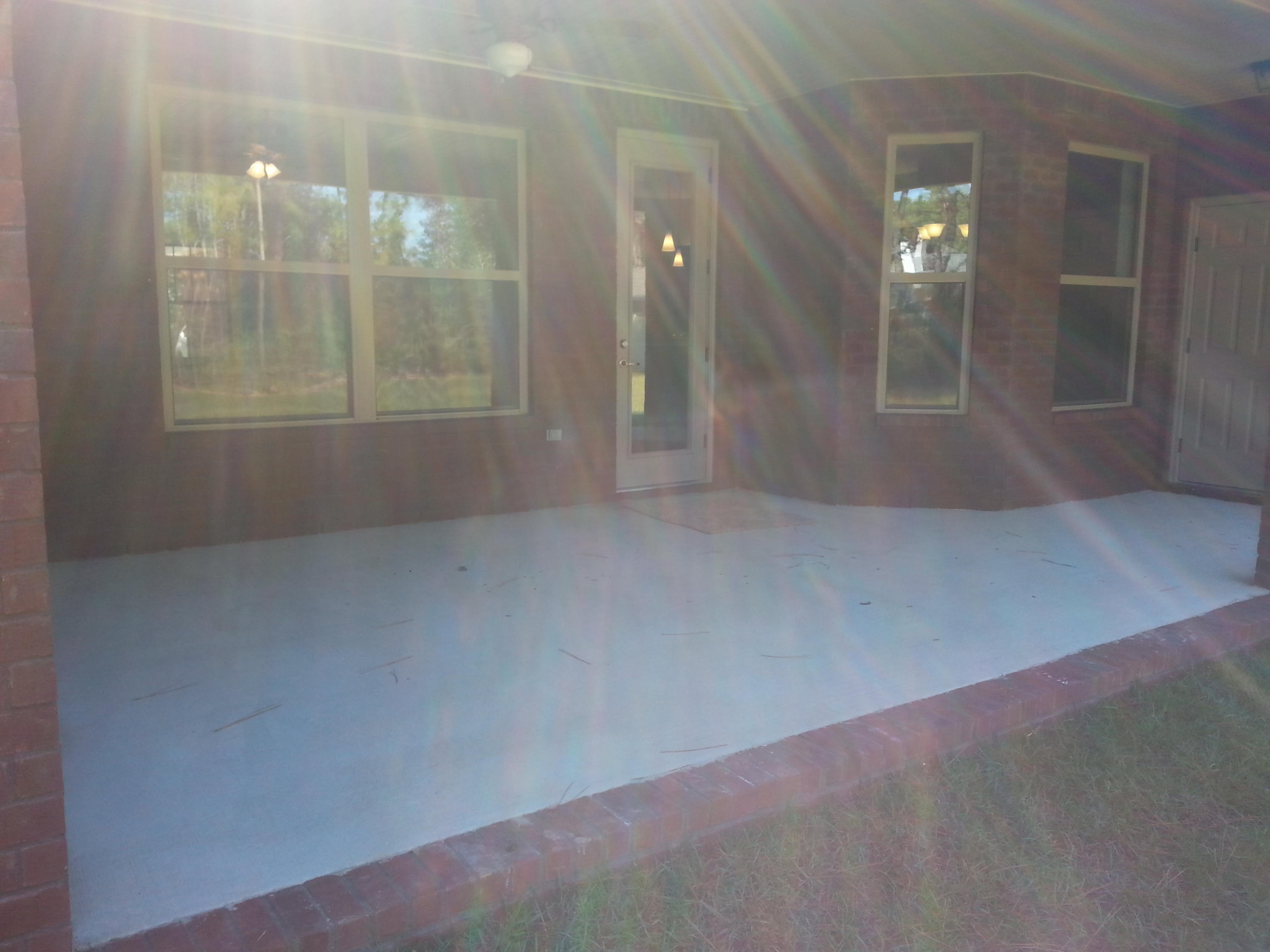 2442 Cove Road Navarre, FL 32566 - Photo 23 of 23 an empty room with windows and entrance