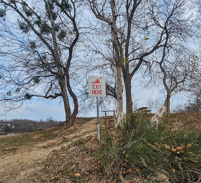 420 Riverside Drive Bastrop, TX 78602 - Photo 4 of 8 a view of a yard with a tree