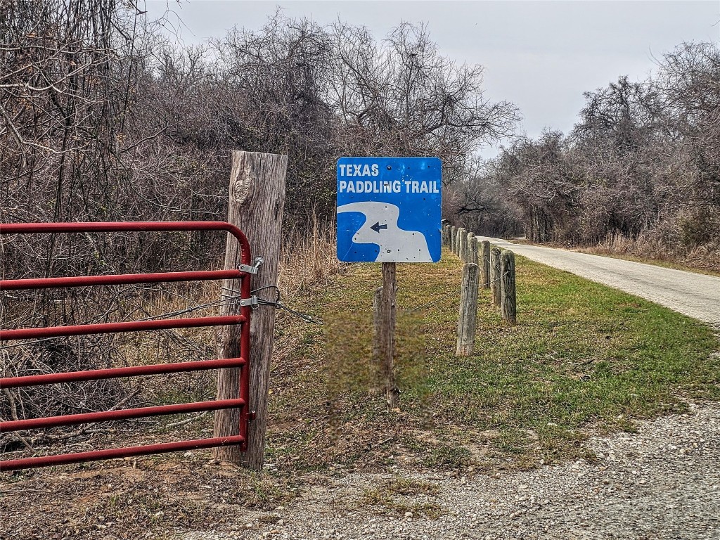 420 Riverside Drive Bastrop, TX 78602 - Photo 6 of 8 a front view of a house with garden