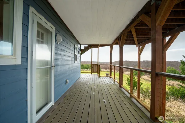 a view of porch with wooden floor in outdoor space
