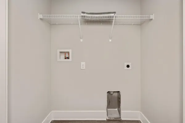 a view of a kitchen with a sink and a window