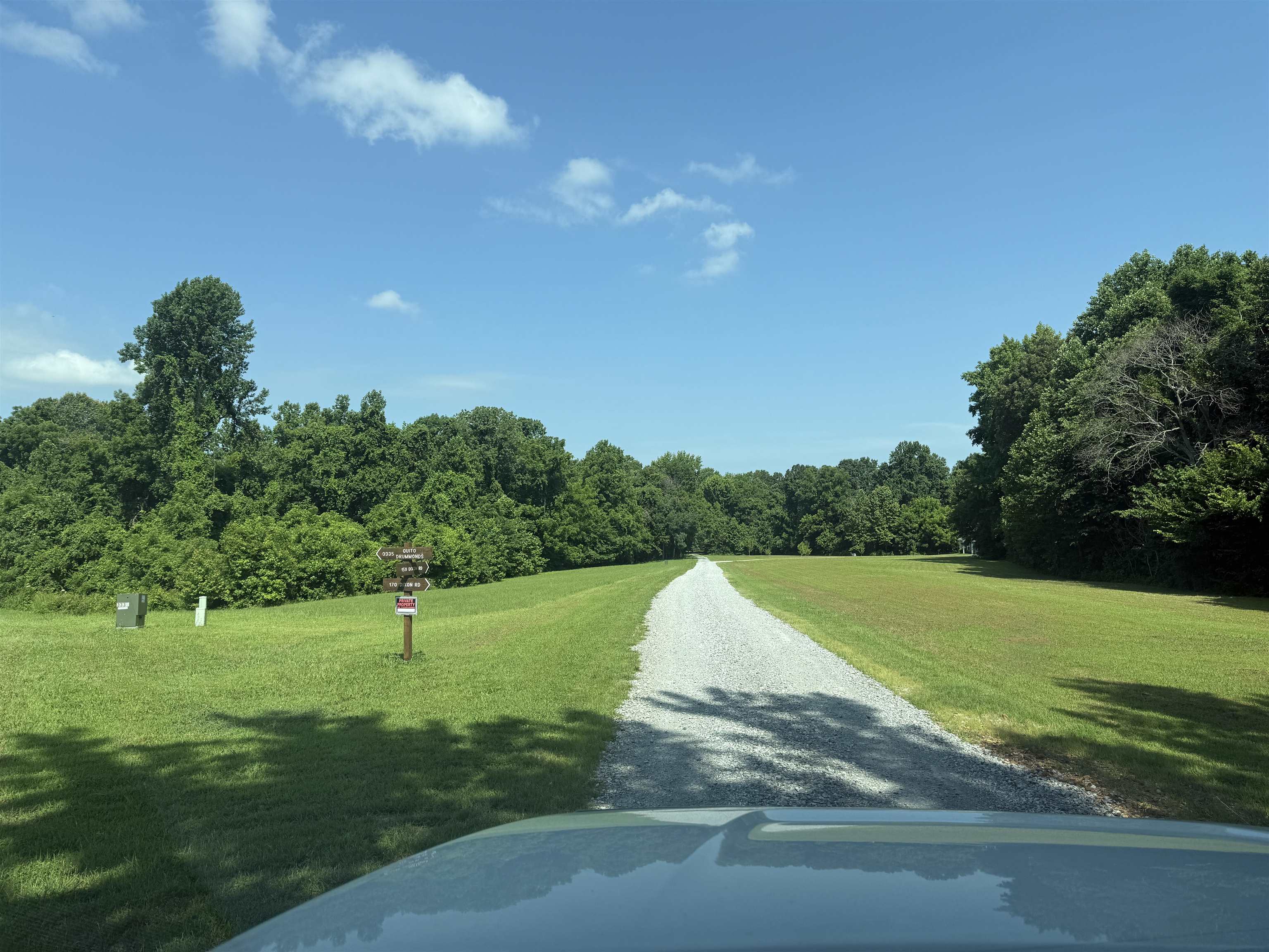 0 Dixon Road Millington, TN 38053 - Photo 4 of 14 View of dirt / gravel road with a forest view