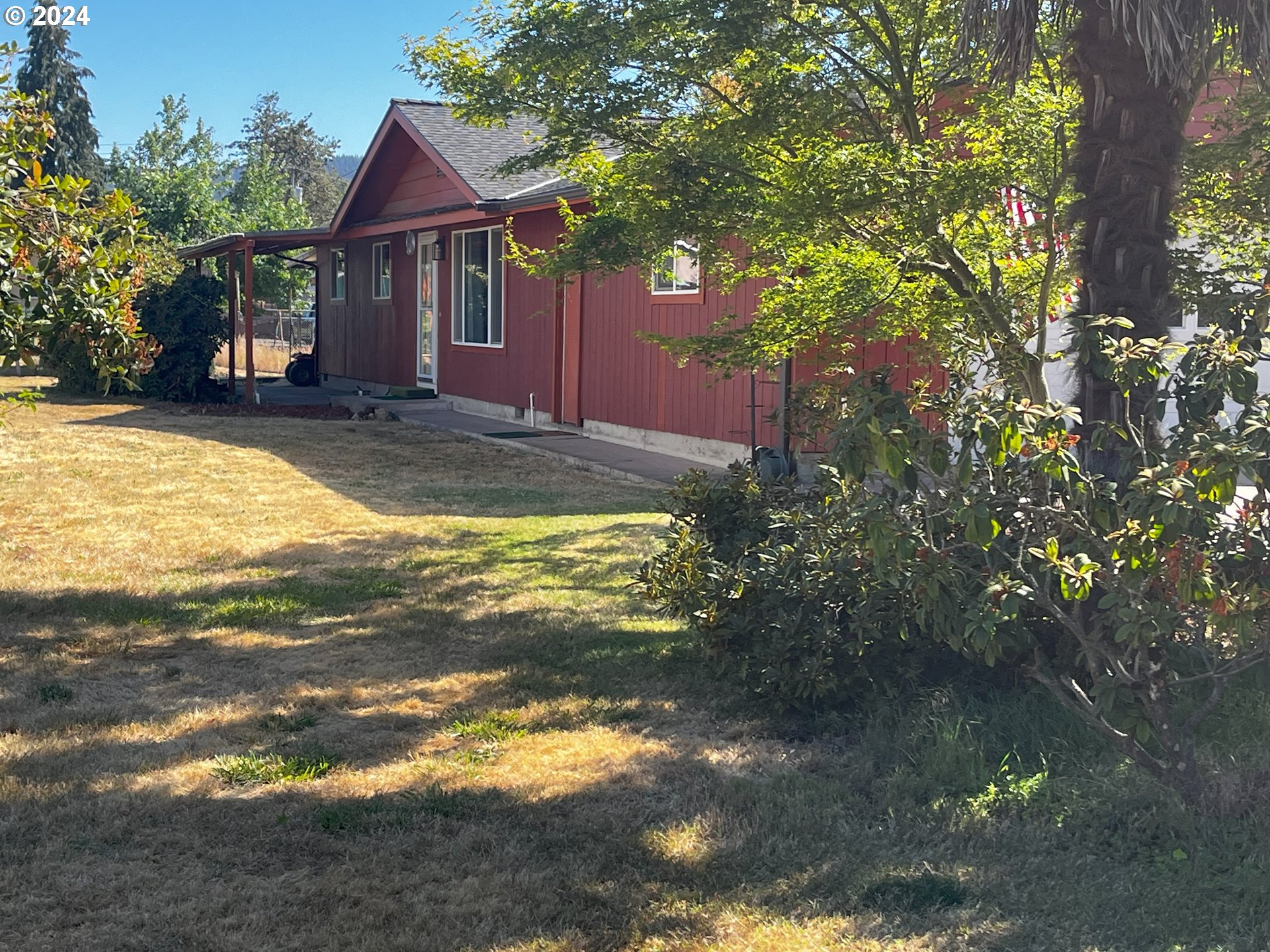4675 Daisy Street Springfield, OR 97478 - Photo 1 of 43 a view of a house with swimming pool