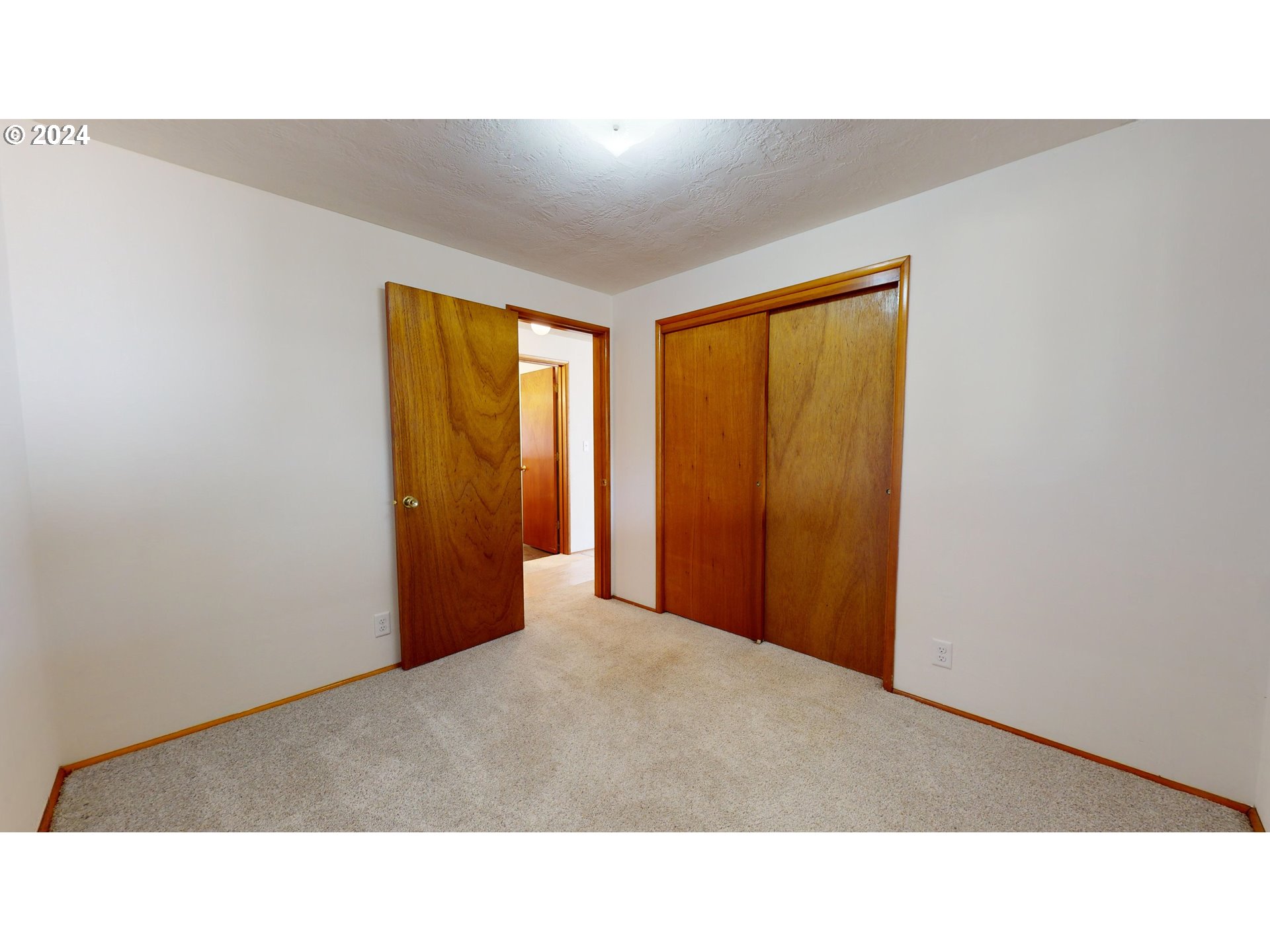 4675 Daisy Street Springfield, OR 97478 - Photo 19 of 43 a open hall with a door