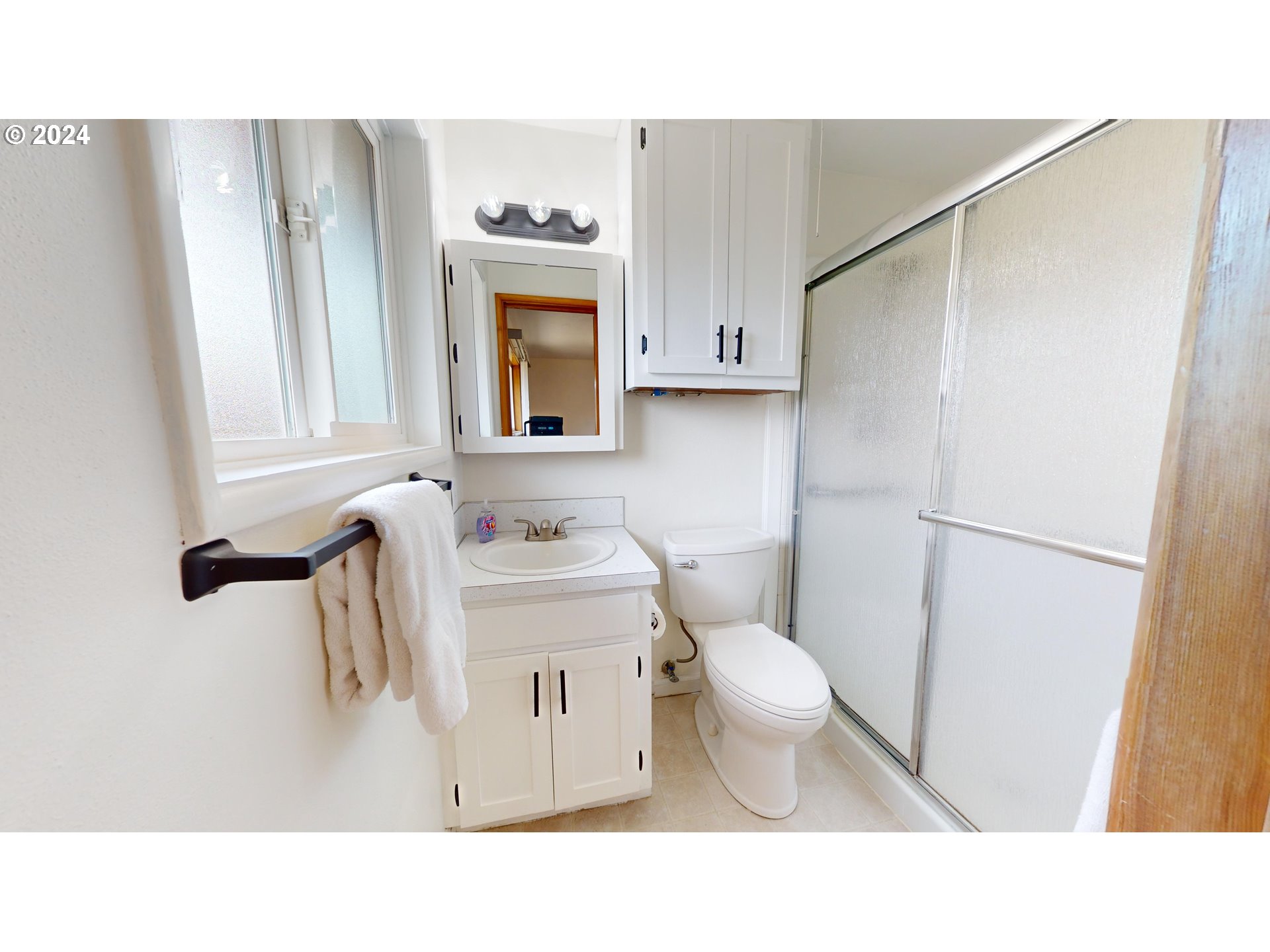 4675 Daisy Street Springfield, OR 97478 - Photo 24 of 43 a bathroom with a sink toilet and shower