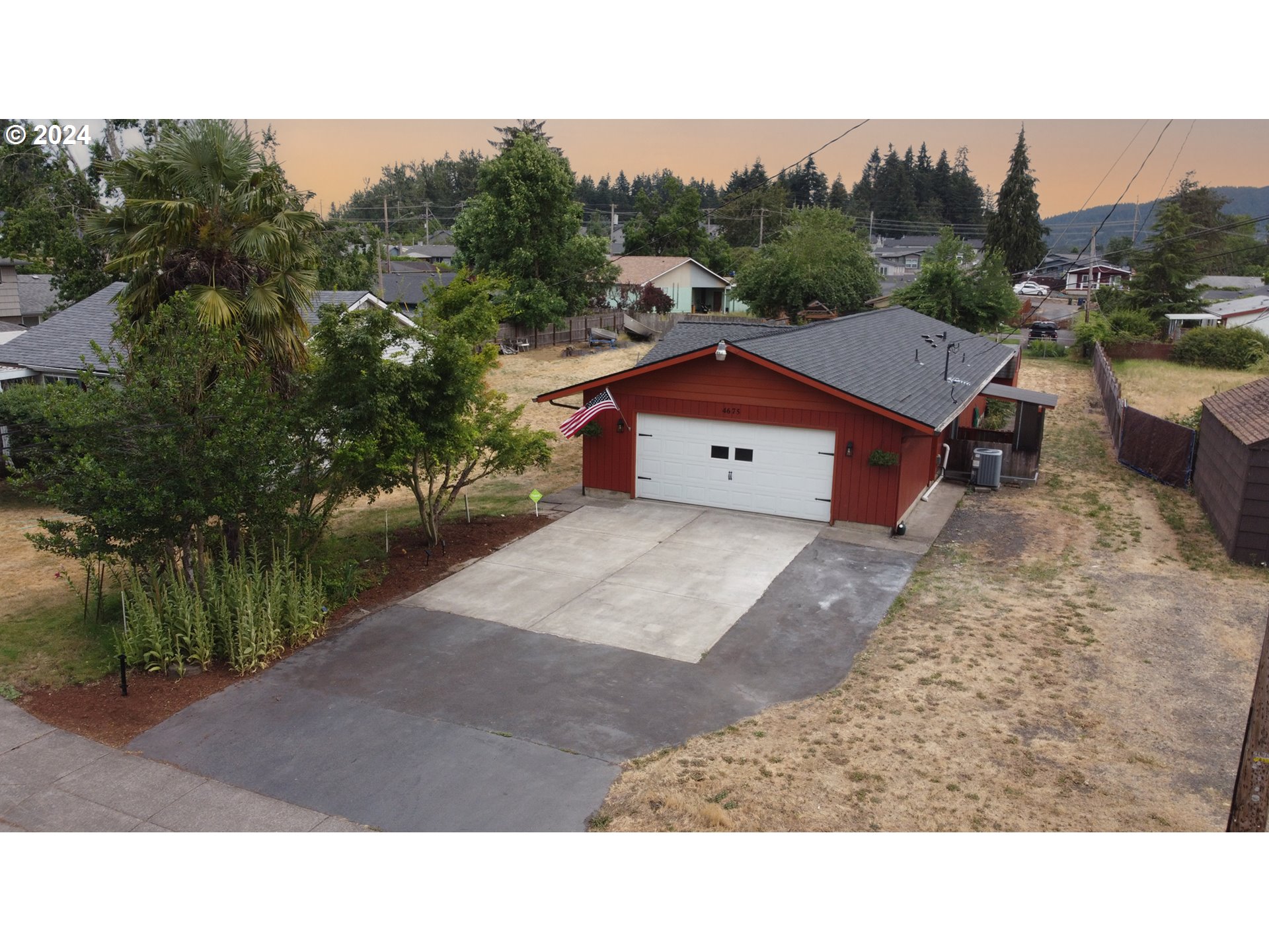 4675 Daisy Street Springfield, OR 97478 - Photo 43 of 43 a aerial view of a house with mountain view