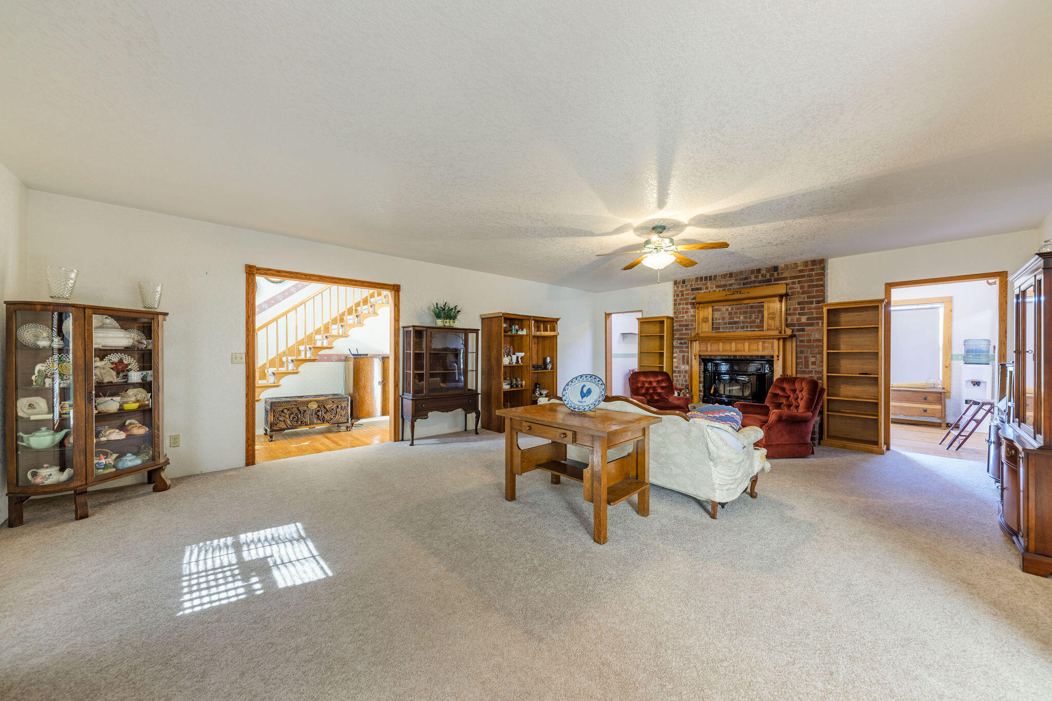 6790 Holland Loop Road Cave Junction, OR 97523 - Photo 18 of 151 a living room with furniture and a flat screen tv