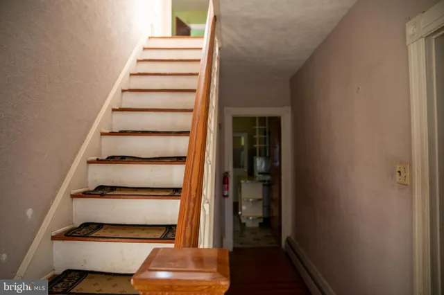 a bathroom with a sink and a window