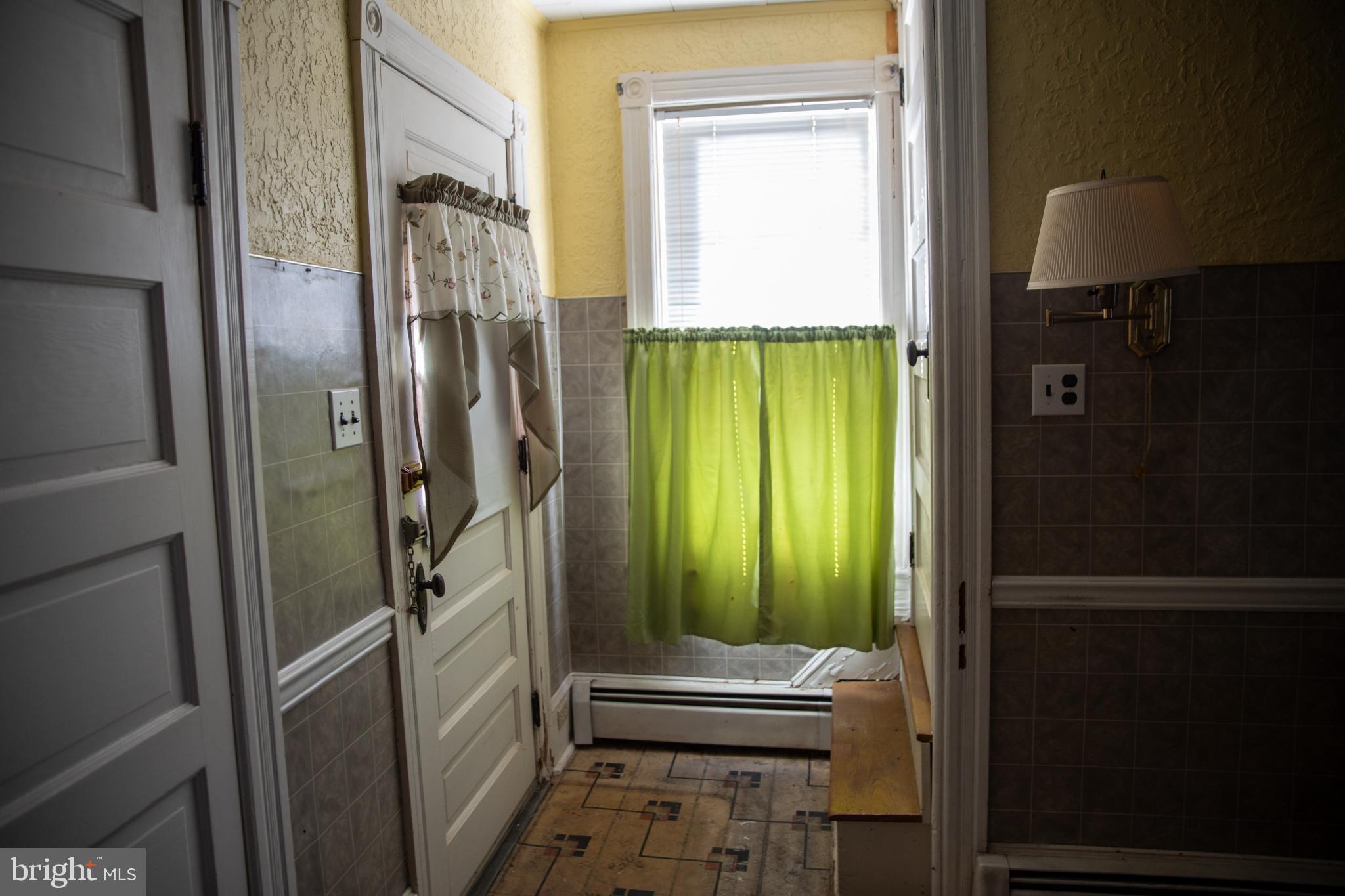 26121 Lewes Georgetown Highway Georgetown, DE 19947 - Photo 47 of 72 a bathroom with a shower