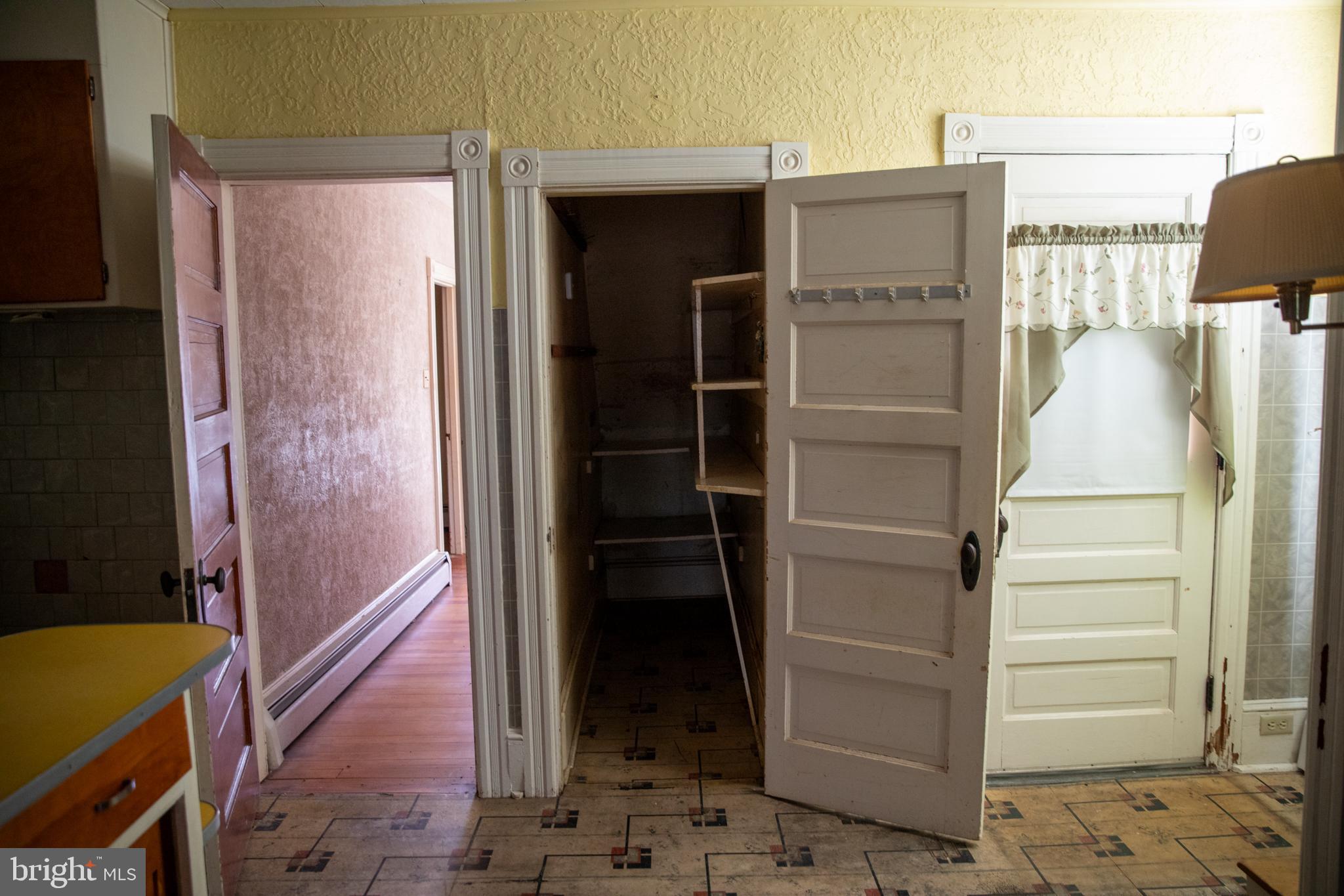 26121 Lewes Georgetown Highway Georgetown, DE 19947 - Photo 48 of 72 a view of walk in closet with empty racks