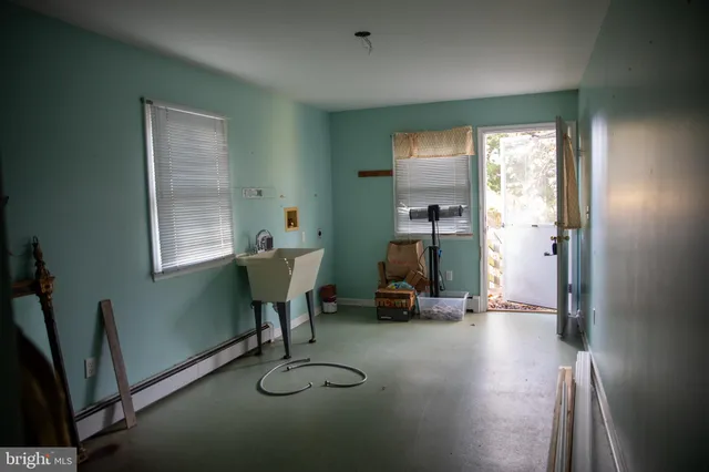 a view of an empty room and window