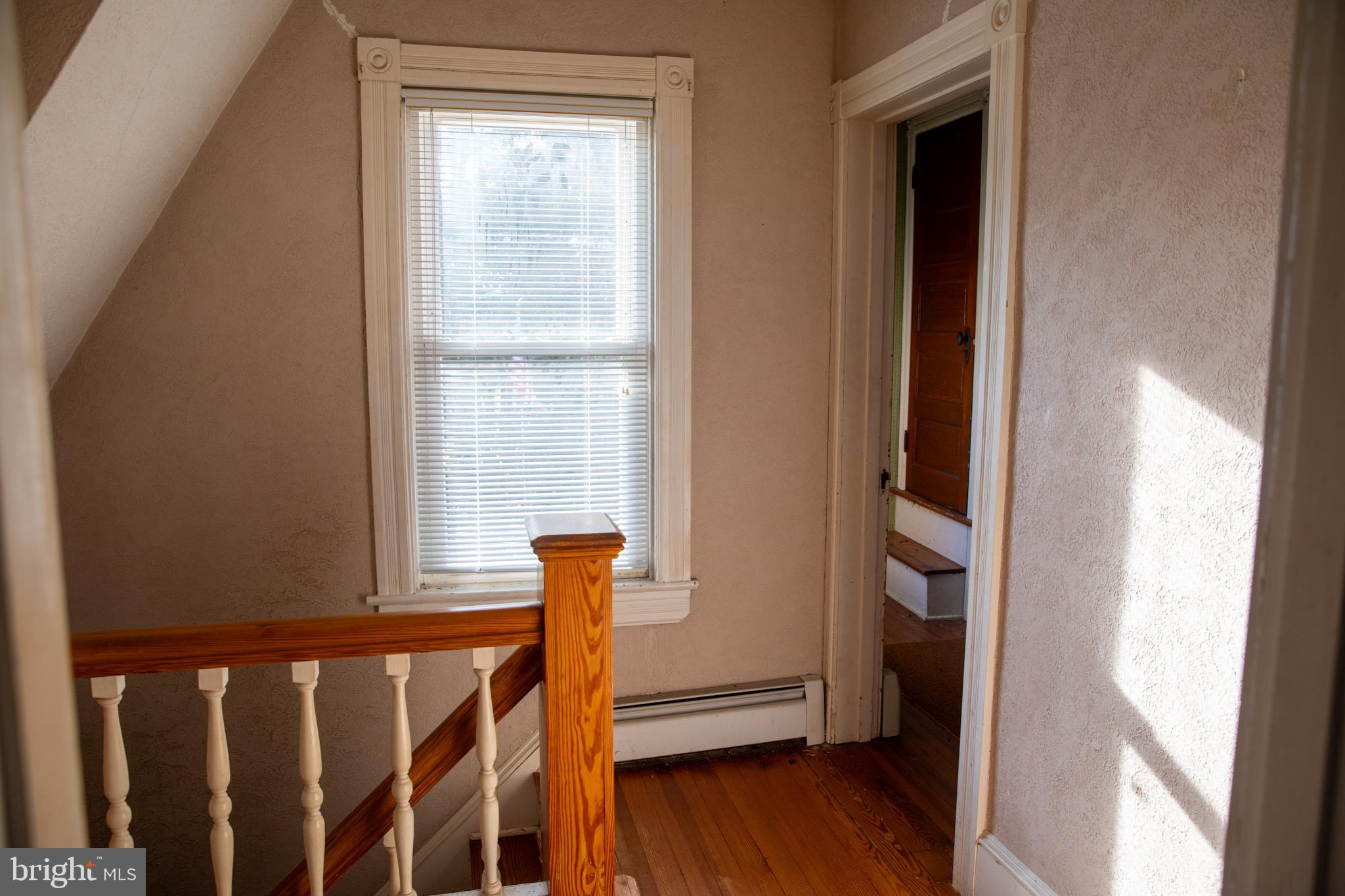 26121 Lewes Georgetown Highway Georgetown, DE 19947 - Photo 68 of 72 a view of front door with wooden floor