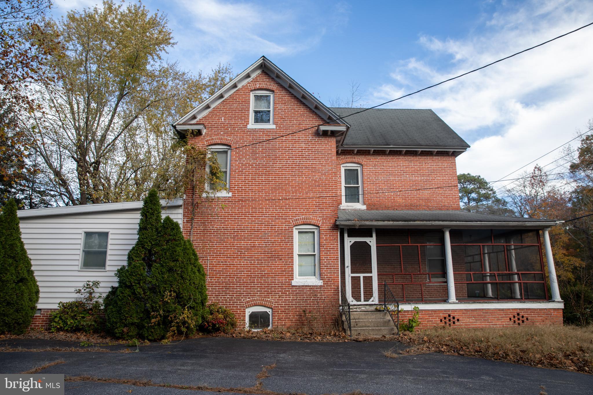 26121 Lewes Georgetown Highway Georgetown, DE 19947 - Photo 7 of 72 front view of a house