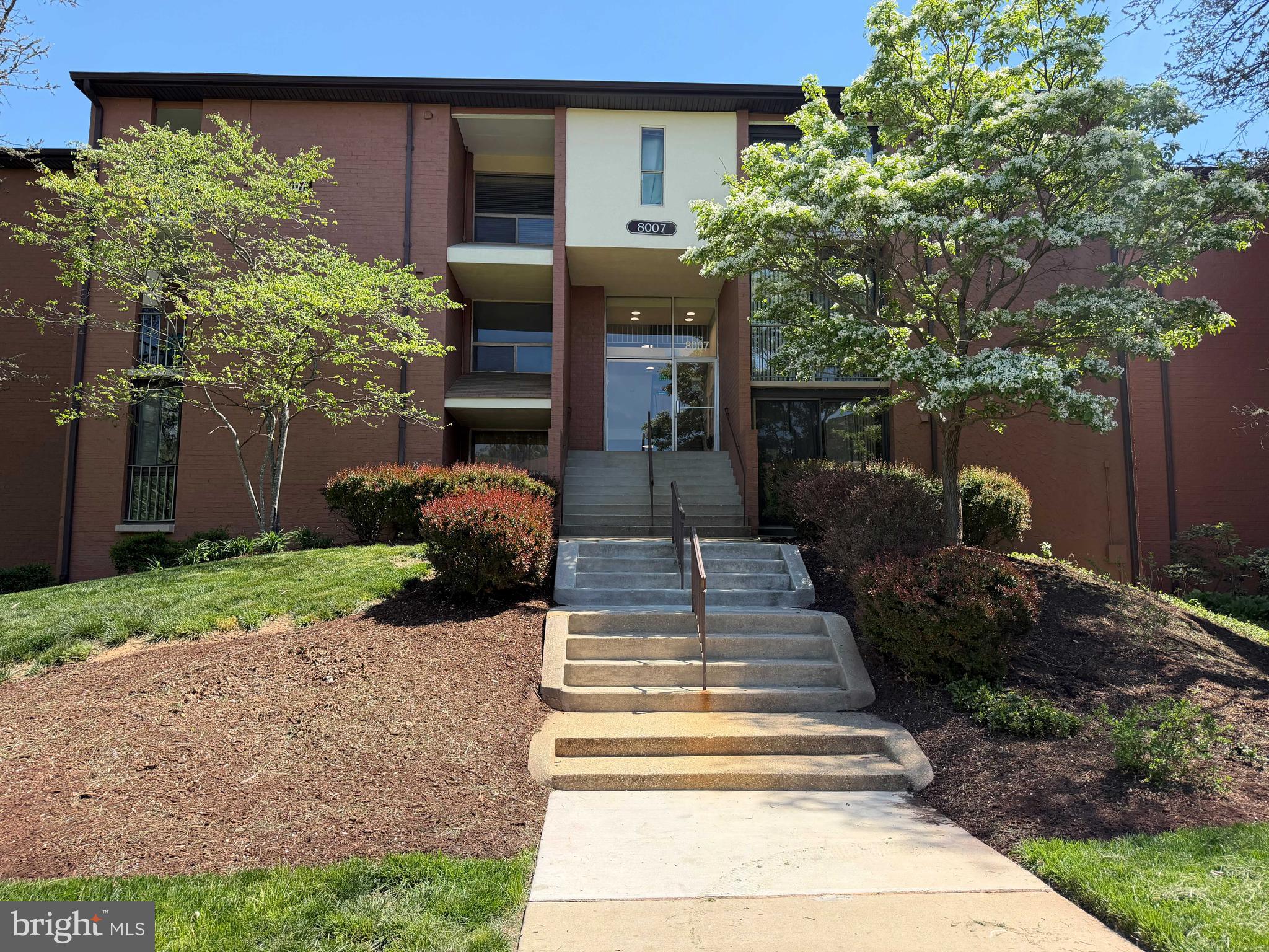 8007 Mandan Road, Unit 605 Greenbelt, MD 20770 - Photo 1 of 15 a front view of a house