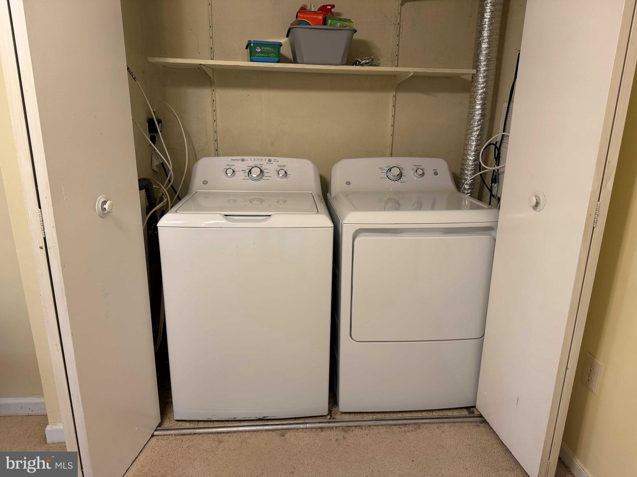 8007 Mandan Road, Unit 605 Greenbelt, MD 20770 - Photo 11 of 15 a utility room with dryer and washer