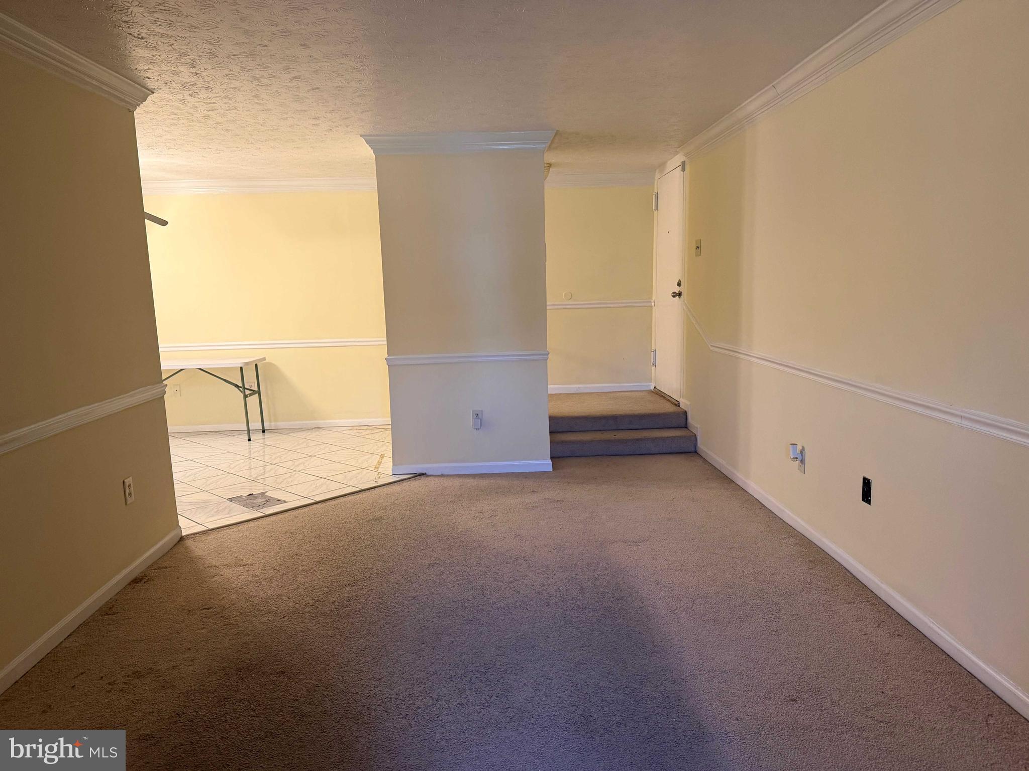 8007 Mandan Road, Unit 605 Greenbelt, MD 20770 - Photo 12 of 15 a view of an empty room