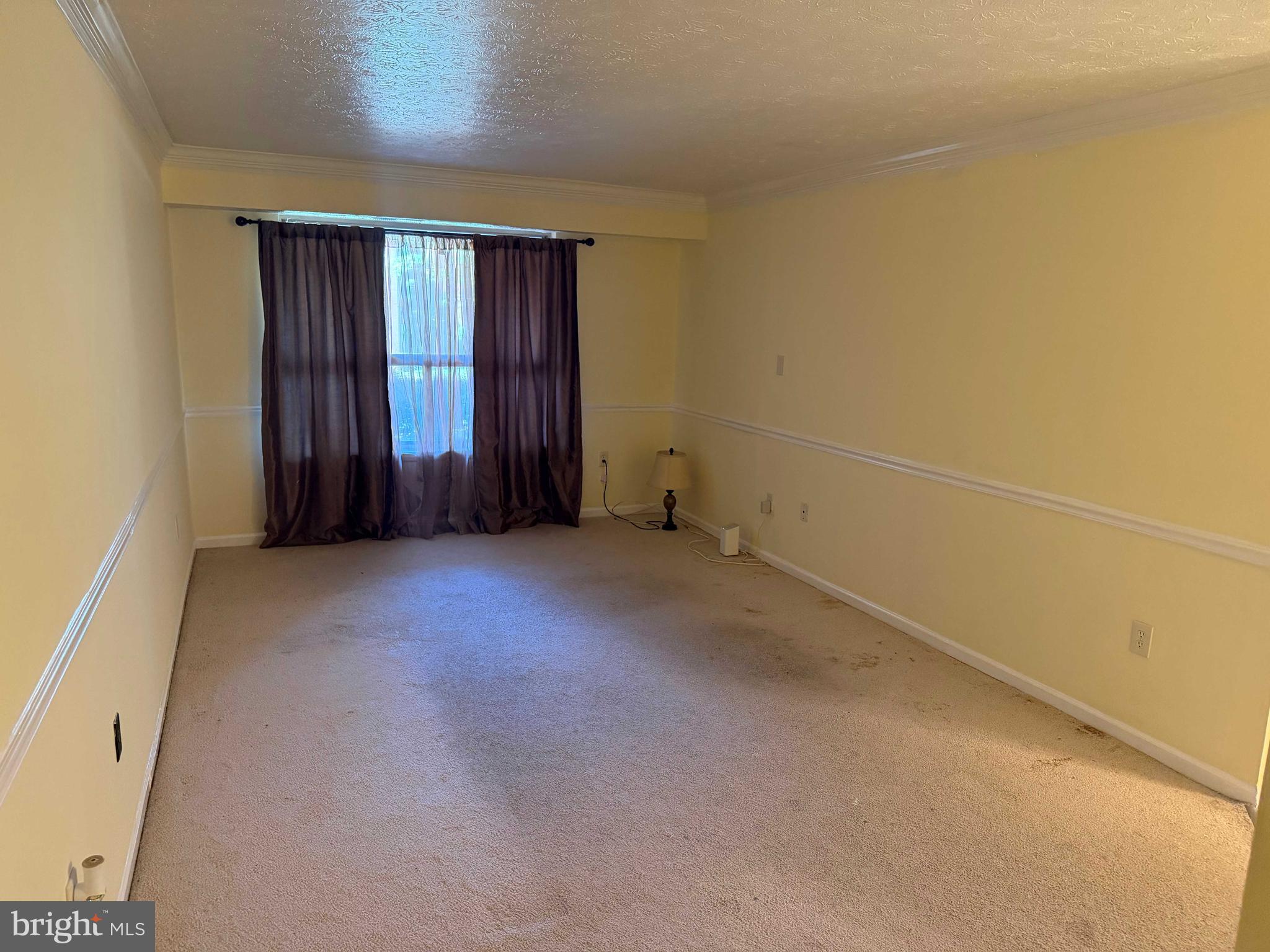 8007 Mandan Road, Unit 605 Greenbelt, MD 20770 - Photo 13 of 15 an empty room with windows