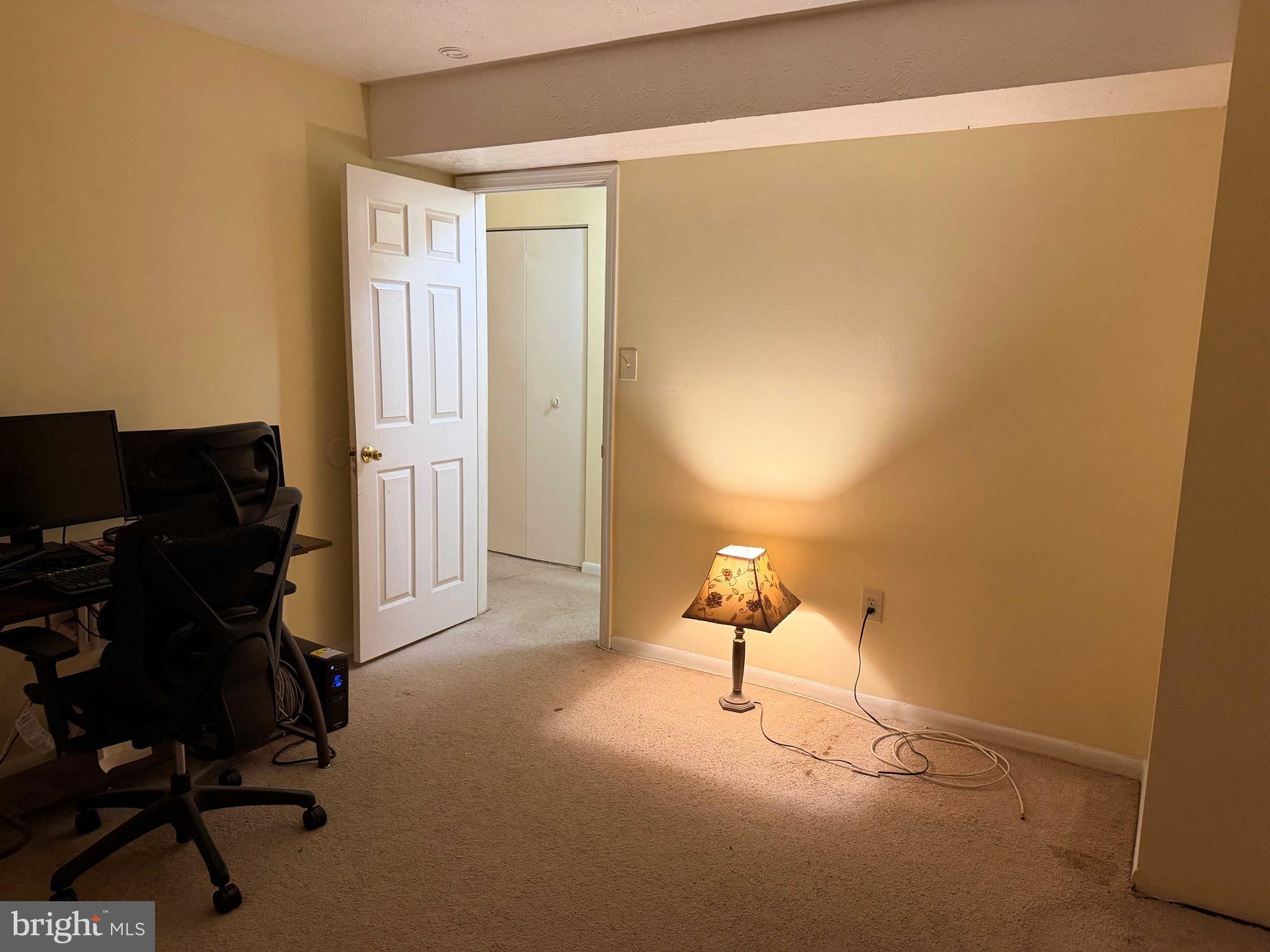 8007 Mandan Road, Unit 605 Greenbelt, MD 20770 - Photo 7 of 15 a view of workspace with windows