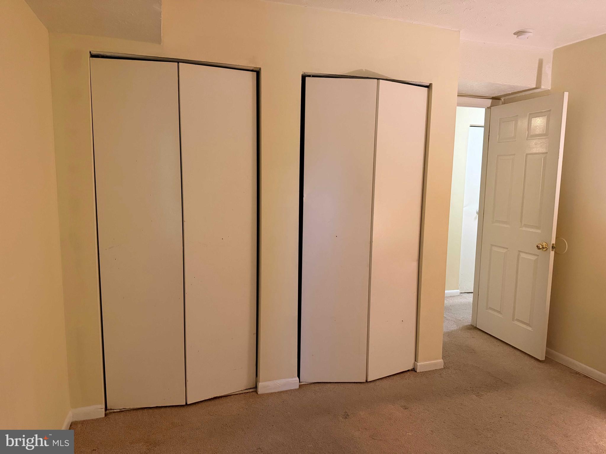 8007 Mandan Road, Unit 605 Greenbelt, MD 20770 - Photo 9 of 15 a view of a closet in a room