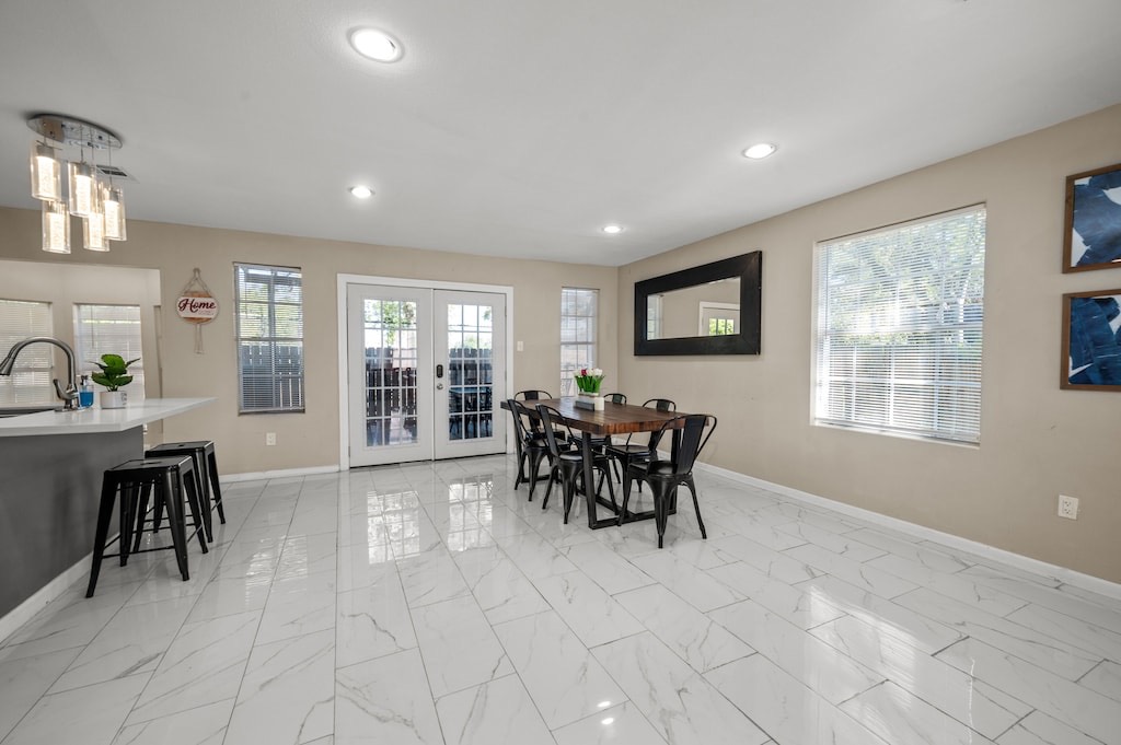 2504 Ferguson Way Houston, TX 77088 - Photo 13 of 32 a view of a dining room with furniture and a window