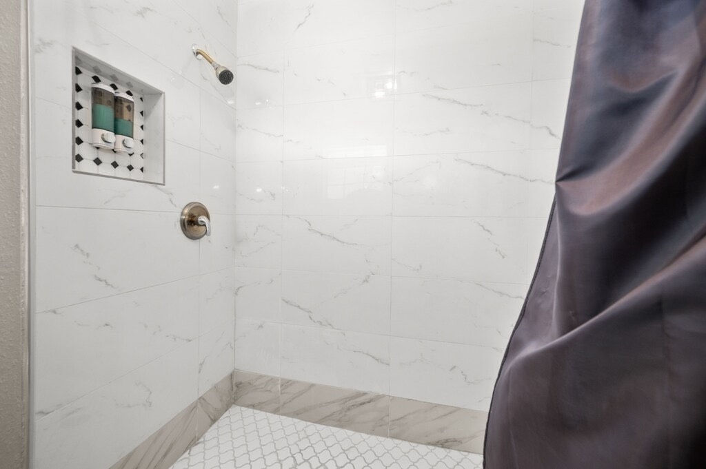 2504 Ferguson Way Houston, TX 77088 - Photo 16 of 32 a bathroom with a shower