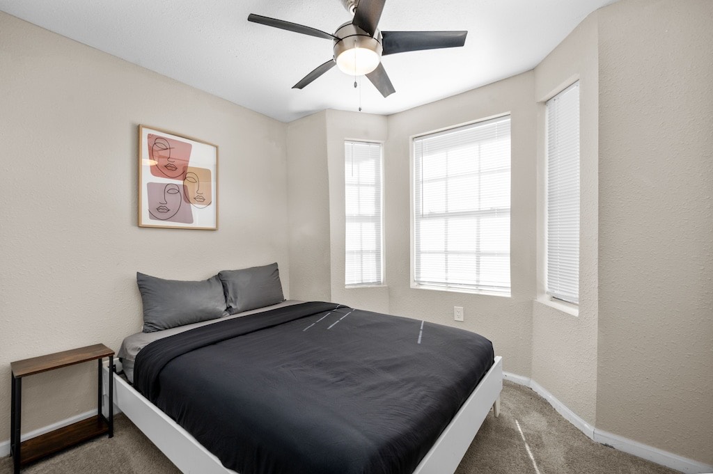 2504 Ferguson Way Houston, TX 77088 - Photo 22 of 32 a bedroom with a bed and window