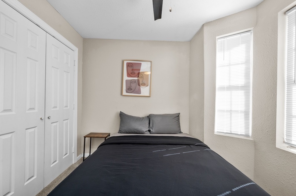 2504 Ferguson Way Houston, TX 77088 - Photo 25 of 32 a bedroom with a bed and a window