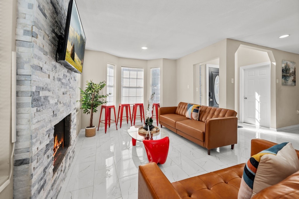 2504 Ferguson Way Houston, TX 77088 - Photo 5 of 32 a living room with furniture fireplace and flat screen tv
