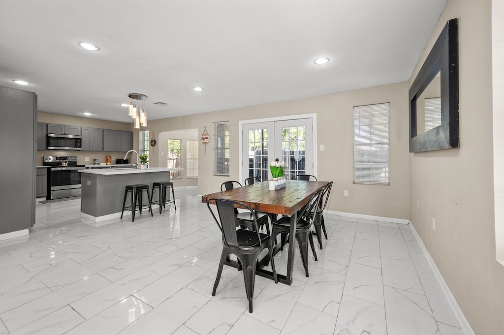 2504 Ferguson Way Houston, TX 77088 - Photo 8 of 32 a view of a dining room with furniture