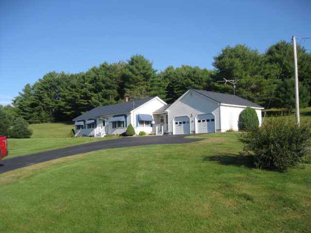 407 Windsor Road South China, ME 04358 - Photo 1 of 17 Exterior Front.