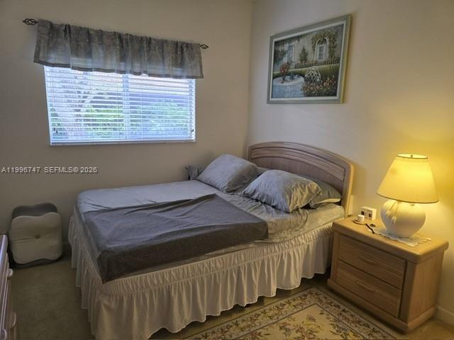 13016 Southwest 142nd Terrace Miami, FL 33186 - Photo 33 of 67 a bedroom with a bed and window