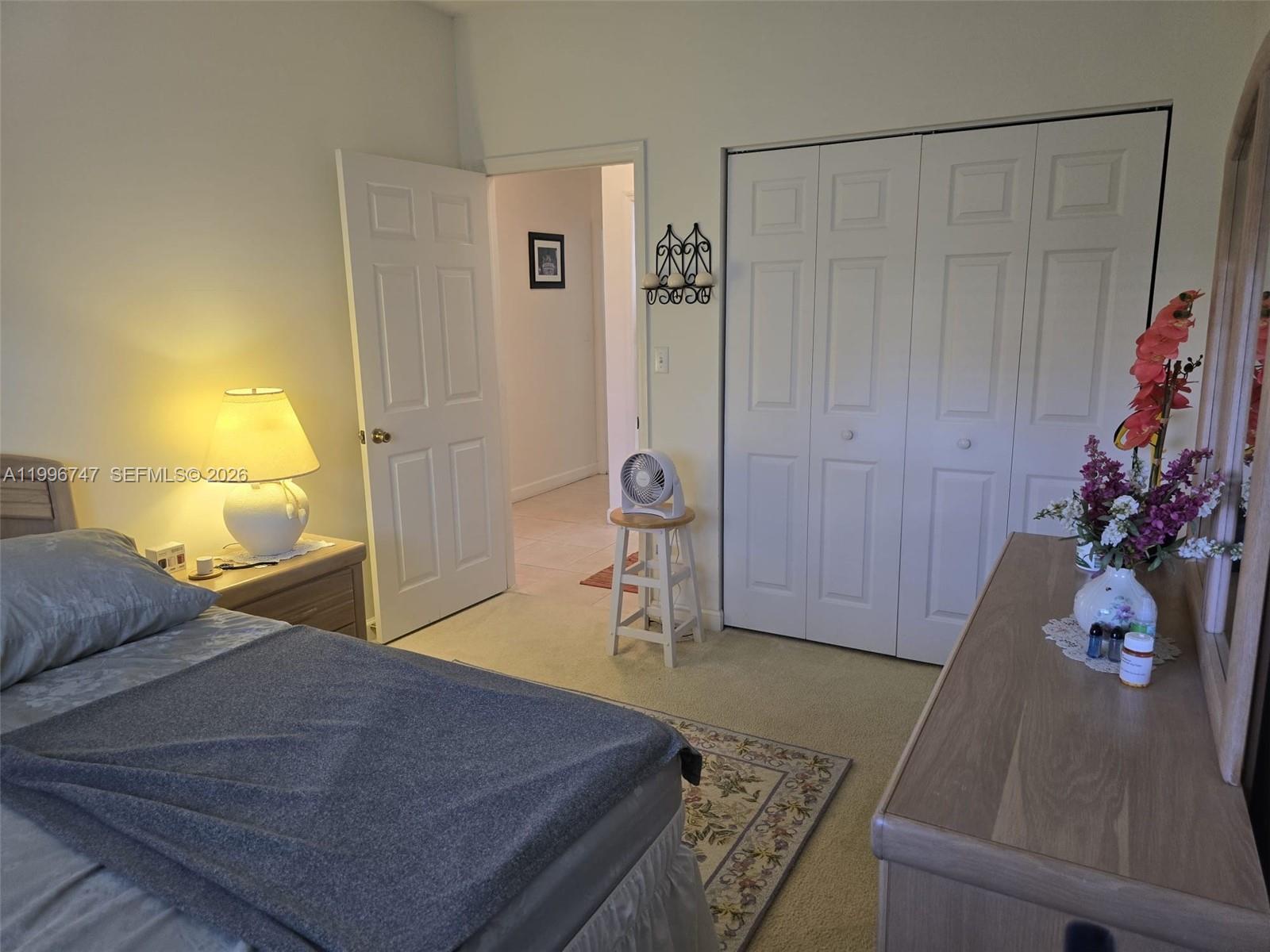 13016 Southwest 142nd Terrace Miami, FL 33186 - Photo 43 of 67 a bedroom with a bed and a cabinets