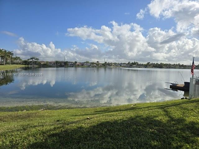 13016 Southwest 142nd Terrace Miami, FL 33186 - Photo 60 of 67 a view of a lake from a yard