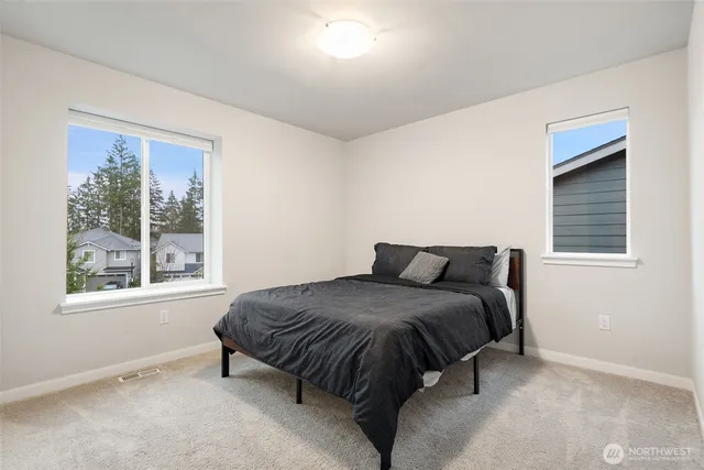 a bathroom with a sink toilet tub and shower